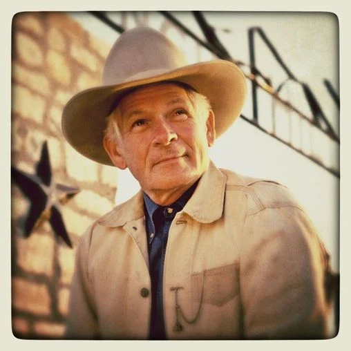 Don Edwards wearing his cowboy hat and Western jacket